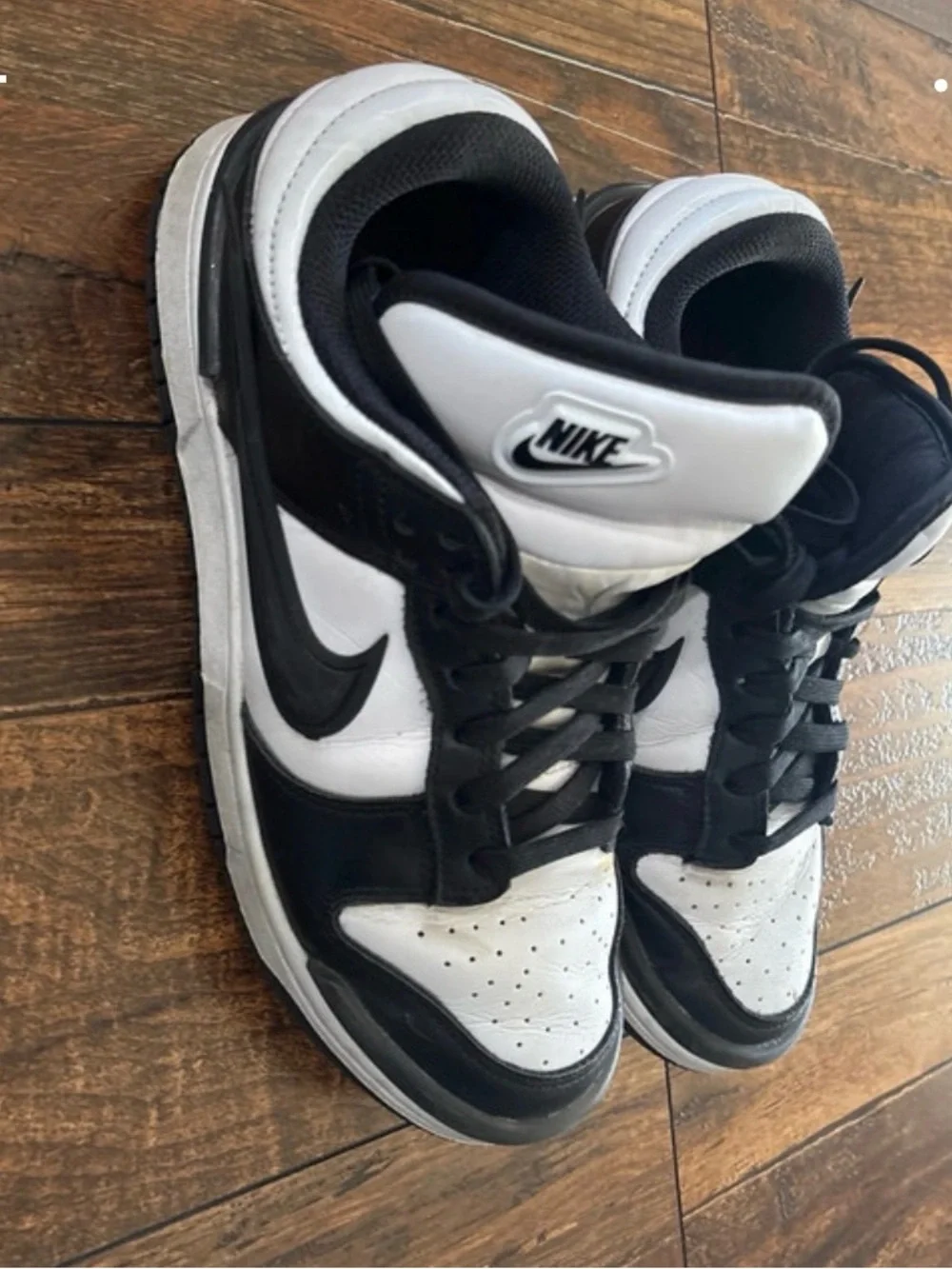 Nike Black and White High-Top Sneakers with Swoosh